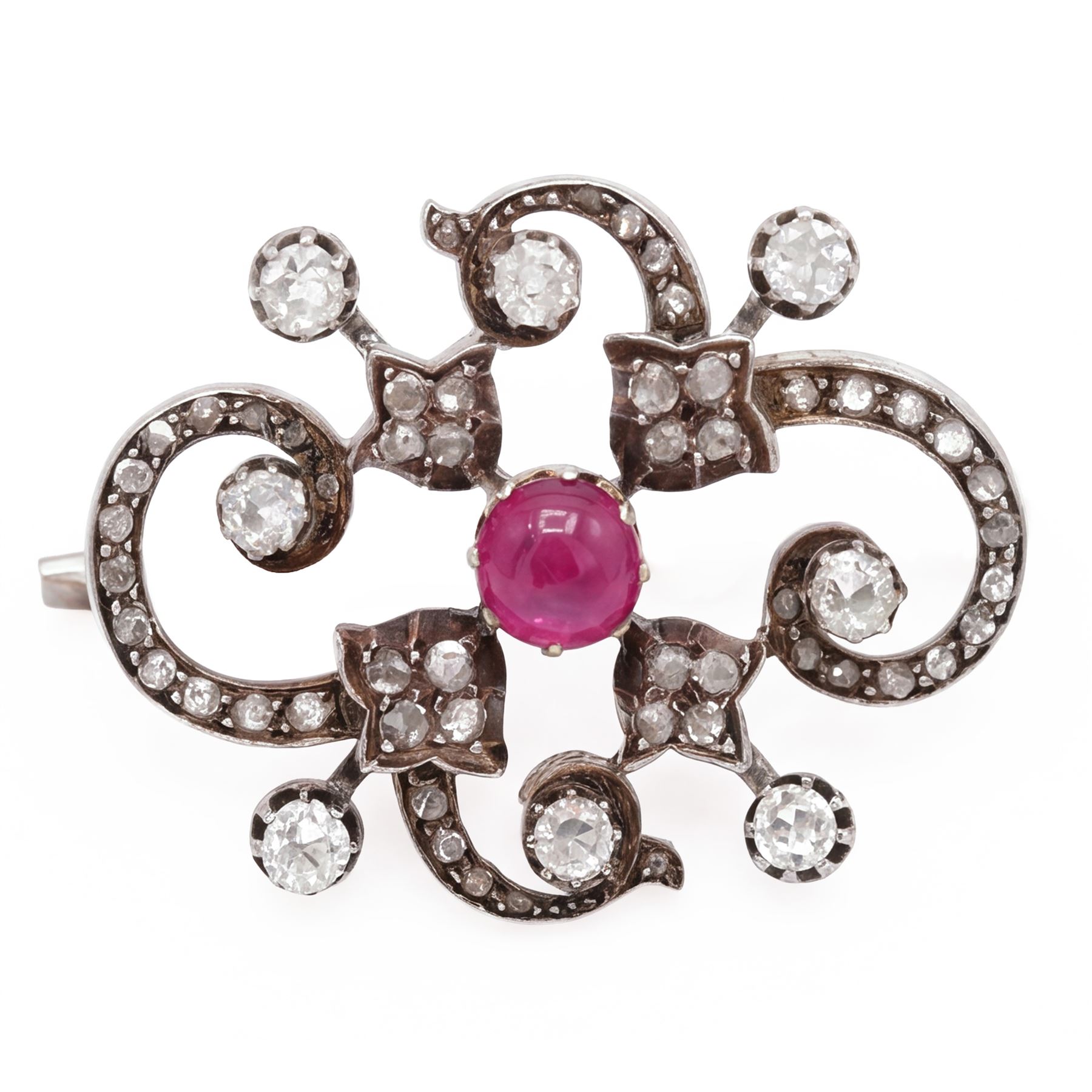 19th century French 18ct white gold ruby and diamond brooch by Eugène Fontenay, centrally set with a single cabochon cut ruby of approx 1.85 carat, the foliate scroll border set with eight old cut diamonds of approx 1.45 carat and rose cut diamonds, stamped with makers mark EF, eagles head and numbered 23960
