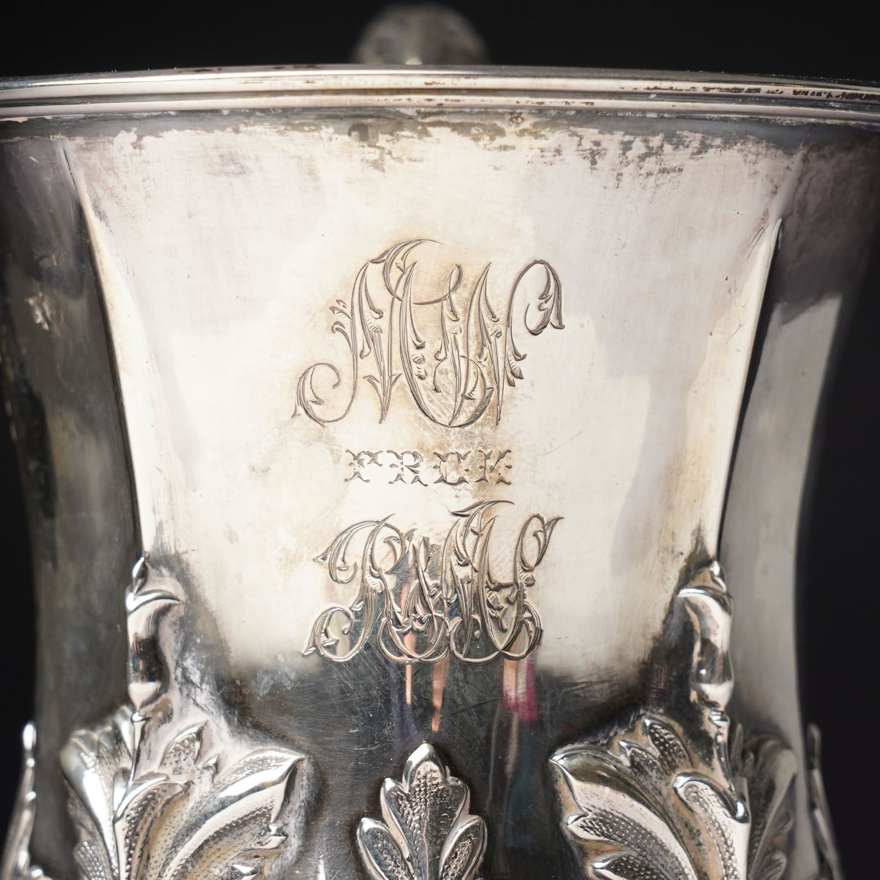 Victorian silver cup with acanthus leaf decoration and scroll handle, H12cm with retailers mark of J Mayer, Liverpool Sheffield 1851Maker Henry Wilkinson & Co