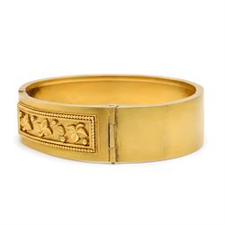 19th / early 20th century gold hinged bangle, with applied ivy leaf, bead and wirework decoration
