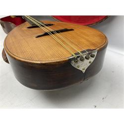 Early 20th century Italian Rafaele Disantino eight-string mandolin with two-piece back and spruce top with stamped Rafaele Disantino signature; bears maker's label L61cm; in wooden carrying case