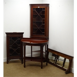  Edwardian mahogany corner display cabinet, dentil frieze, single door enclosing shaped shelves, square tapering supports joined by an undertier (W68cm, H185cm, D39cm) a wall hanging corner cabinet, single door enclosing two shelves, a demi lune side table and an inlaid mirror (4)  