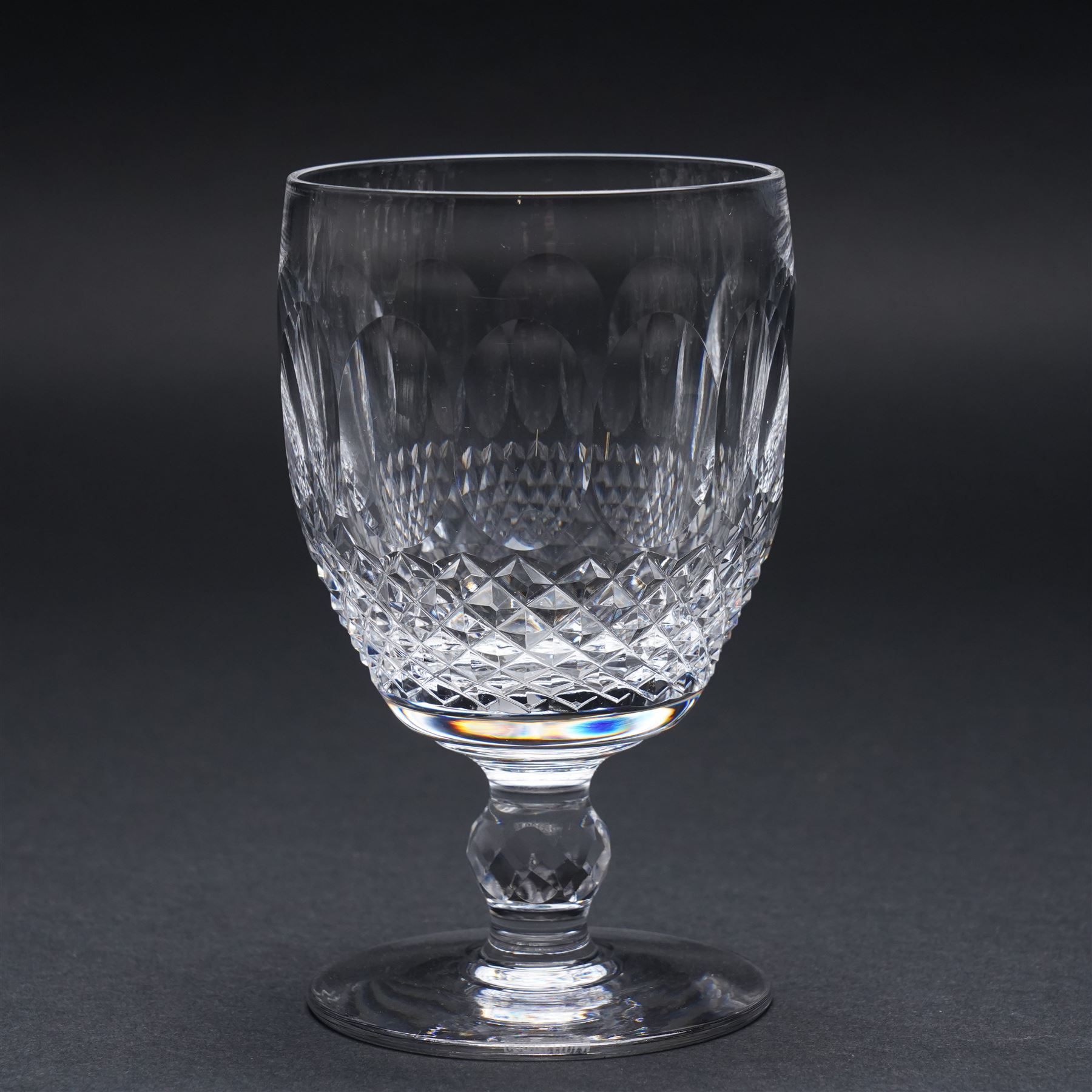 Suite of Waterford Colleen pattern table glass comprising six claret glasses, six hock glasses, six small tumblers, six sherry glasses and two decanters