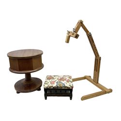 Oak sewing stool on a pedestal base with a hinged lid and compartmented interior, together with an upholstered footstool and wooden tapestry stand, sewing stool H46cm 