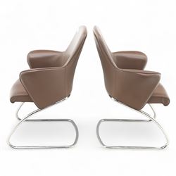 Two Senator executive cantilever chairs, upholstered in Padova hide, moulded back and integrated armrests, raised on a tubular chromed cantilever base