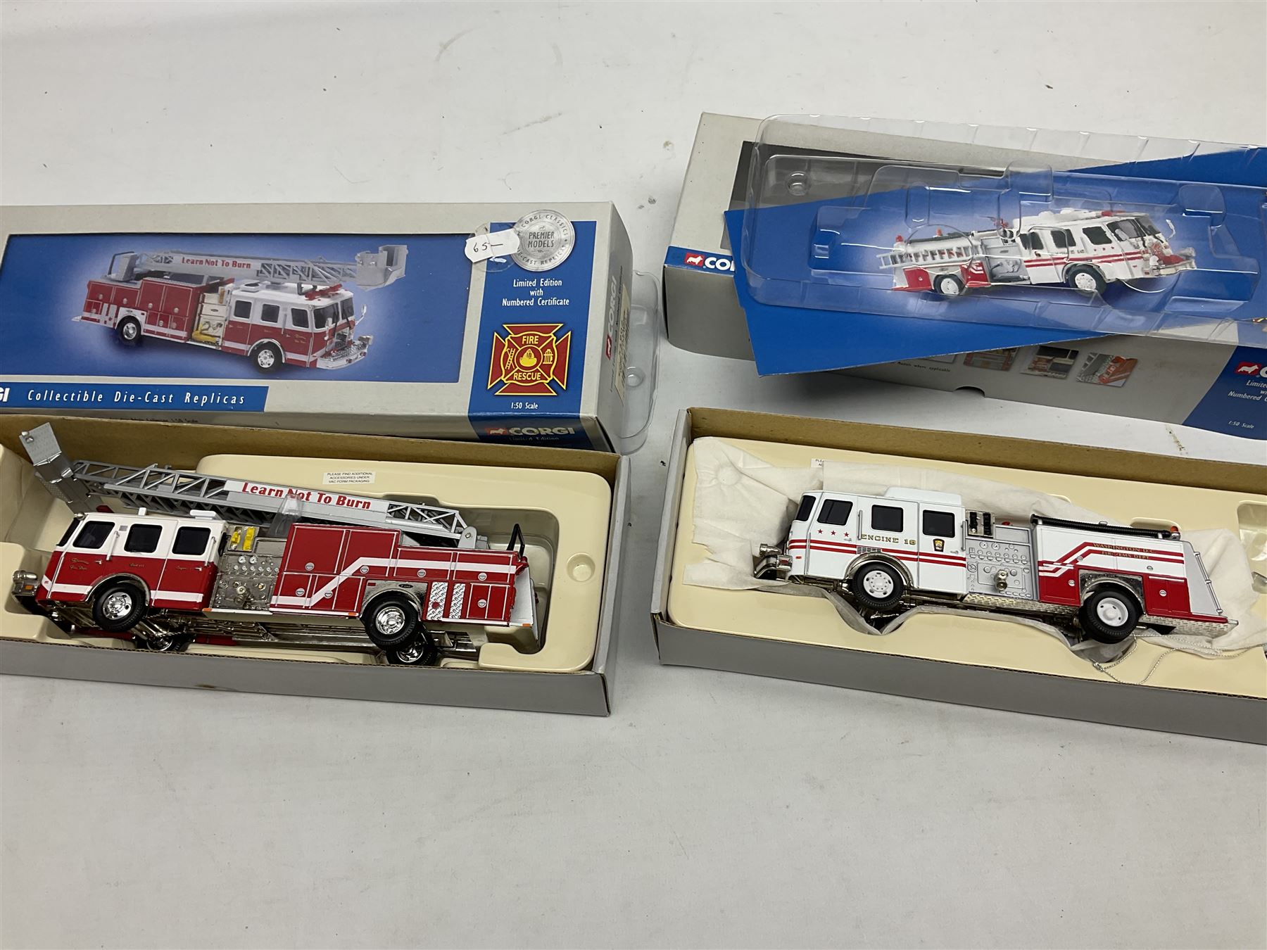 Corgi - eleven fire-fighting vehicles comprising limited edition 54706 E1 Side Mount Washington DC and 54902 E1 75ft Ladder Duncan Fire Department; 97392 Simon/Dennis Hydraulic Platform; 97361 AEC Turntable Ladder;  and seven 'Fire Heroes'; all boxed (11)