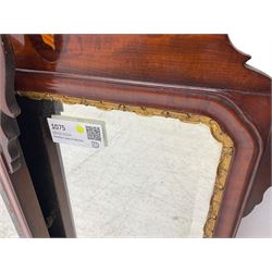 Pair of early 20th century Georgian Chippendale mahogany design wall mirrors, shaped pediment and terminal with shell motif inlays, rectangular bevelled plate within a foliate carved gilt slip