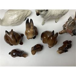 Group of Beswick figures to include leopard no 1082, rabbits, swan, pheasant no 1226 etc, all with marks beneath