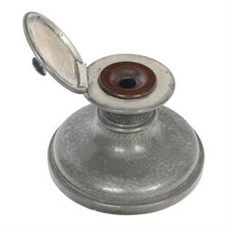 Liberty Tudric pewter ink well, the hinged lid opening to reveal original bakelite liner, stamped marks to base Tudric English Pewter Liberty & Co 01135