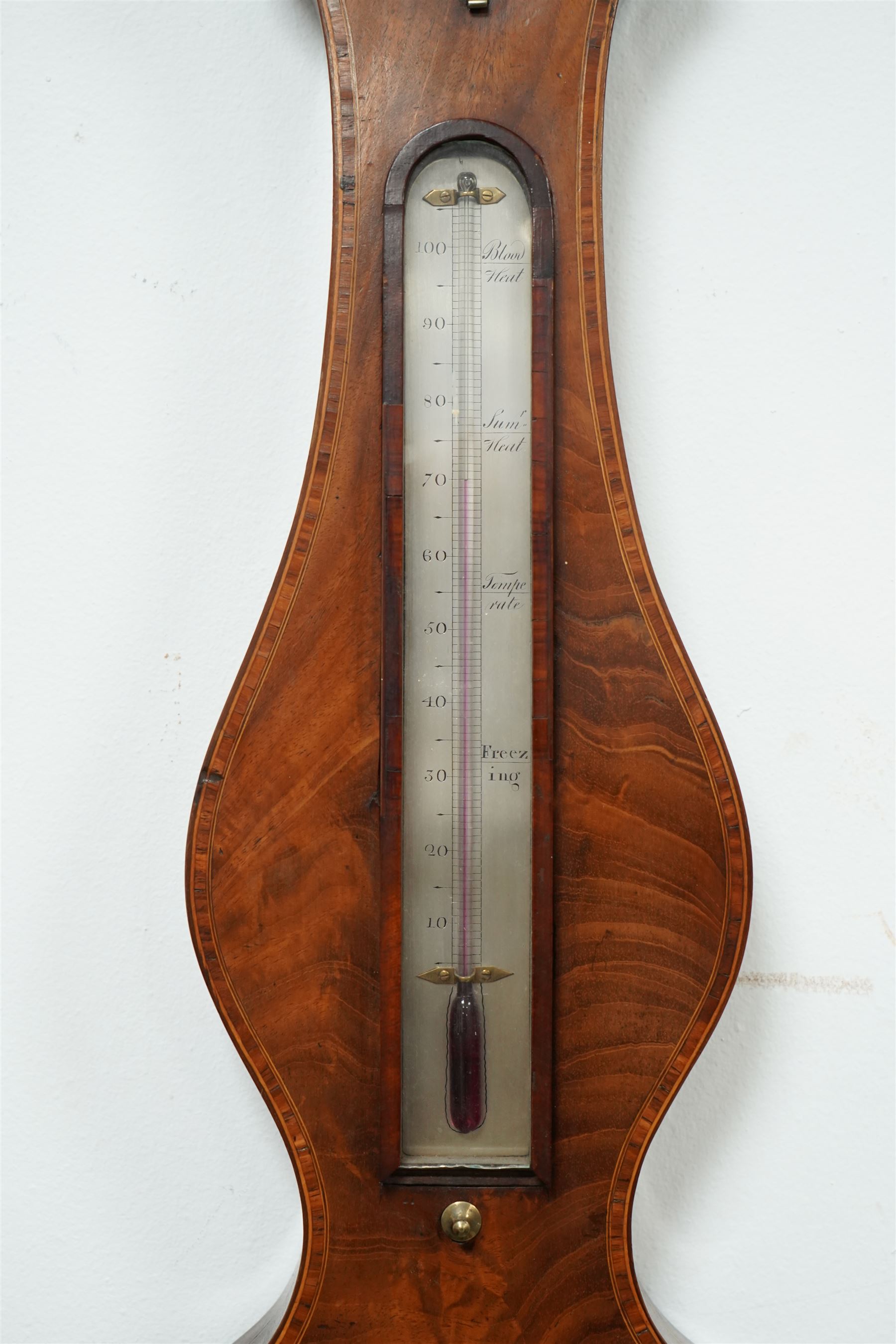 Zanetti of Manchester- late 19th century wheel barometer in a mahogany case with a break arch pediment, brass finial and rounded base, with a hydrometer, spirit bubble and boxed spirit thermometer, 12