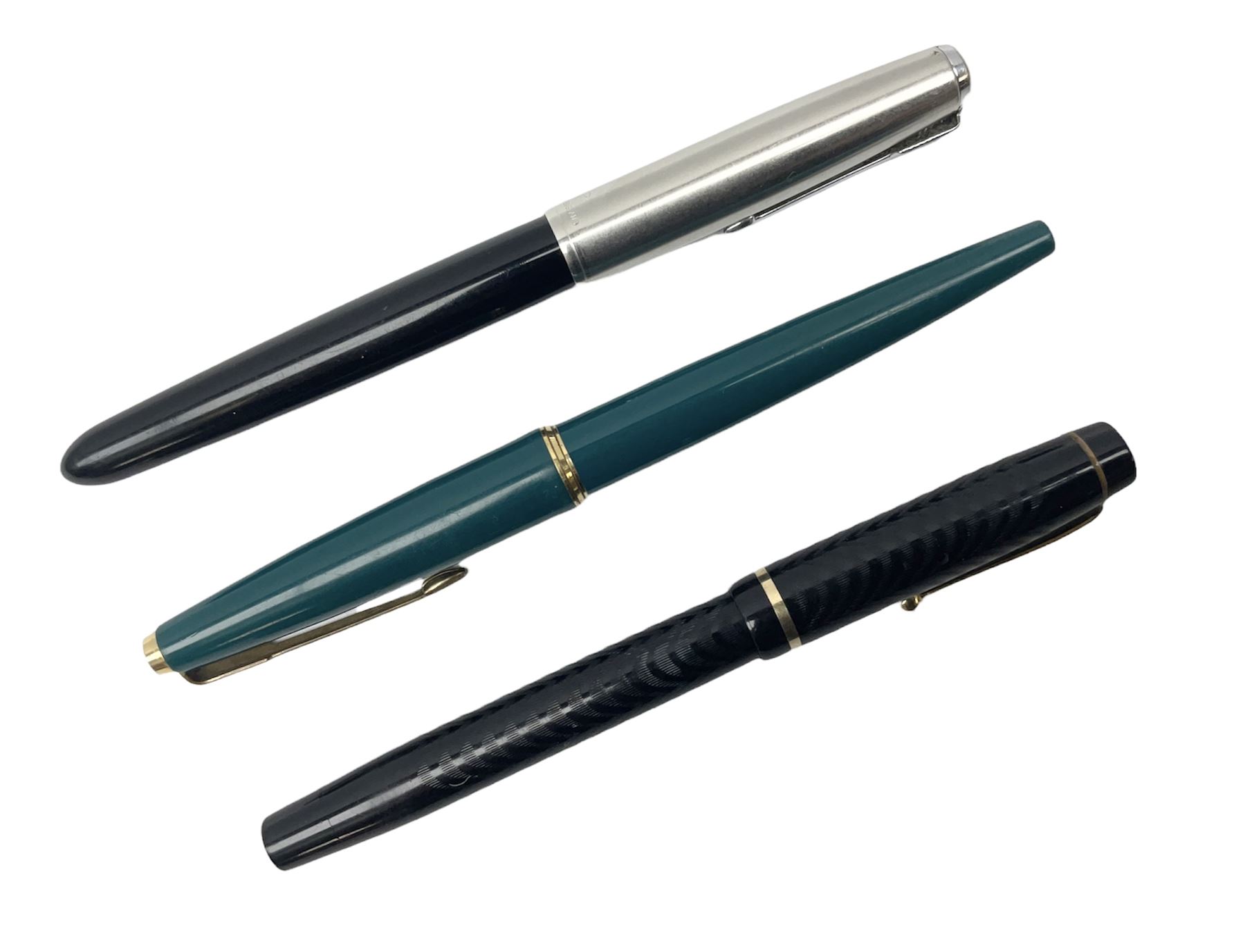 Three fountain pens, comprising two Parker examples with recessed nibs