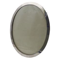 1920's silver mounted photograph frame, of plain oval form with easel style support verso, hallmarked Baldwin & Marriott, Birmingham 1924, overall H28cm W23cm, aperture H25.5cm W20.5cm