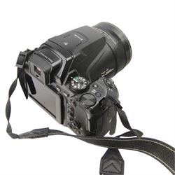 Nikon Coolpix P900 digital camera serial no. 40116983, with a Nikkor 83x wide optical zoom ED VR 4.3-357mm 1:2.8-6.5 lens, boxed with strap, Cobra case, dual and single chargers and three batteries