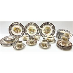 Royal Worcester Palissy Game Series pattern dinner wares, comprising seven dinner plates, six side plates, twelve bowls, sauce boat and stand, six tea cups, eight saucers, further larger saucer, milk jug, and open sucrier. 