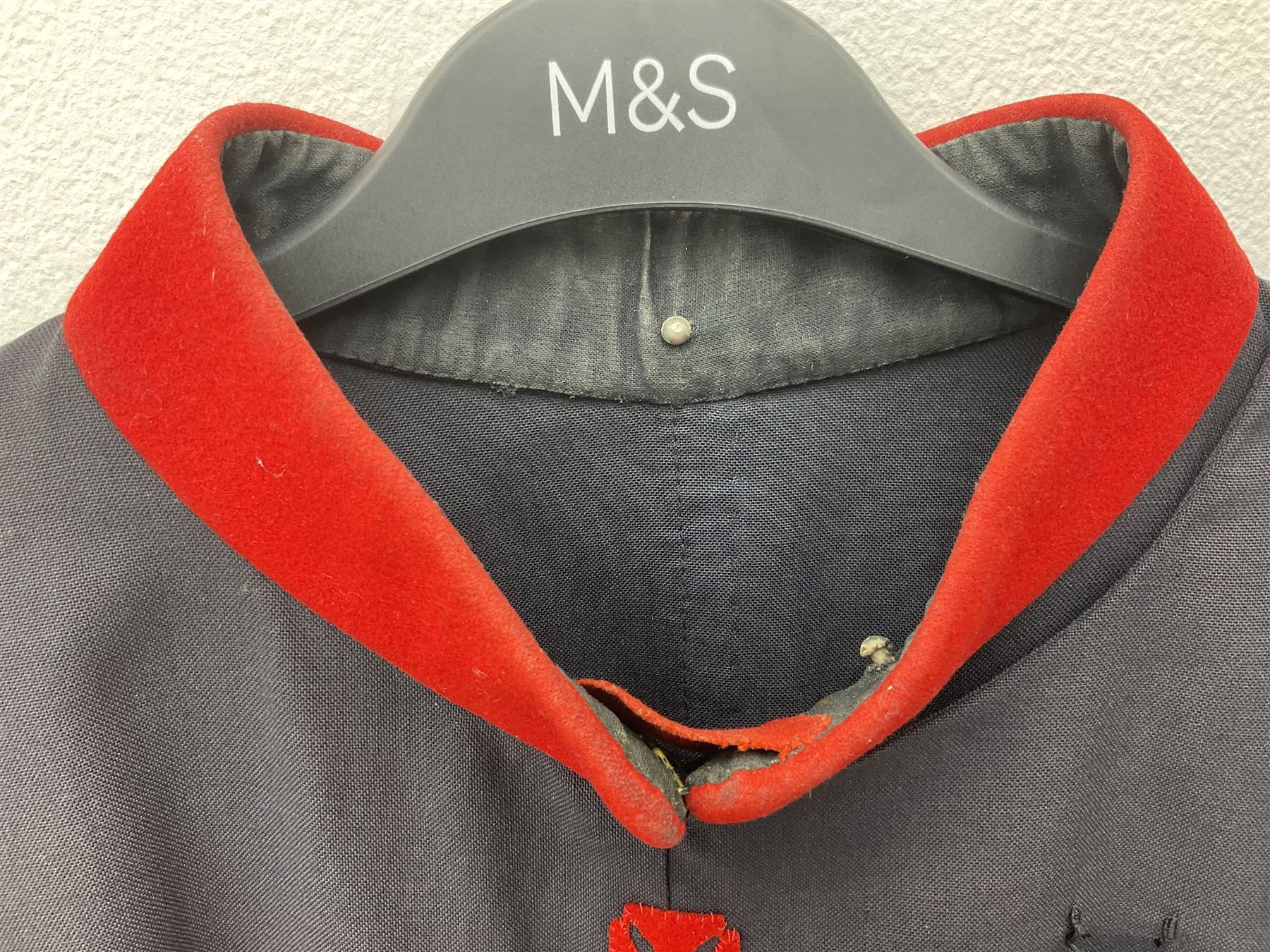 Elizabeth II Yeoman Warders (Beefeater) No.1 Undress blue uniform - comprising tunic bearing label Crown Military Uniforms H.M. Tower of London and bonnet by S. Patey (2) 