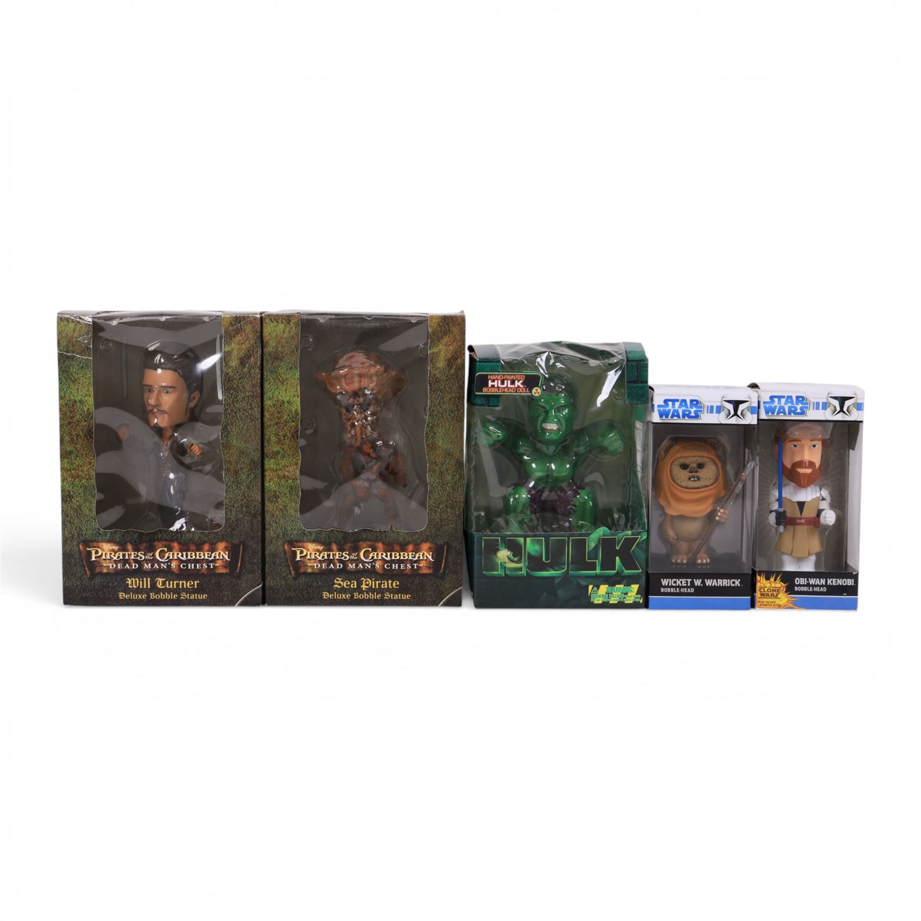 Five bobble-heads, comprising two Cards Inc Pirates of the Caribbean examples Sea Pirate and Will Turner, Two Funko Star Wars examples Wicket W Warrick and Obi-Wan Kenobi and a Cards Inc Characters Hulk example, all boxed