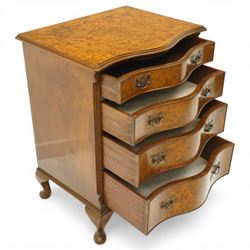 Queen Anne design figured walnut serpentine-front chest, fitted with four graduating cock-beaded drawers flanked by canted fluted uprights, on cabriole feet