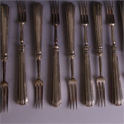Set of twelve 1920s silver handled dessert knives and forks, hallmarked Thomas Bradbury & Sons Ltd, Sheffield 1921