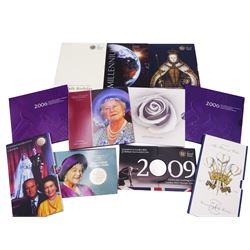 Eleven Queen Elizabeth II United Kingdom five pound coins, including 1990 '90th Birthday of the Queen Mother', 1999 'Millennium', 2008 'Sixtieth Birthday', etc. all in card folders or on cards