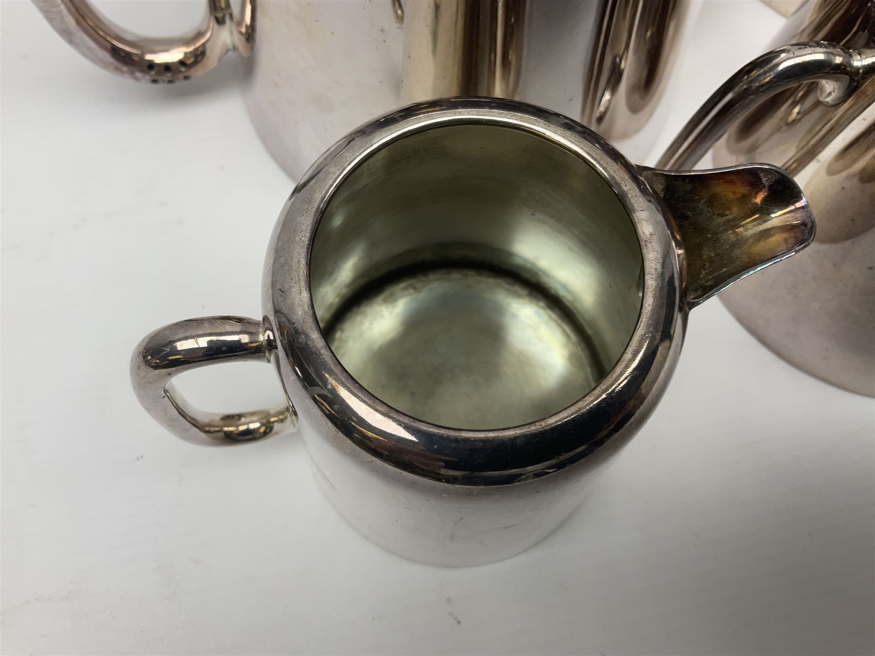 EPNS four piece tea service, comprising teapot, coffee pot, sugar bowl and milk jug