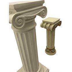 Classical Ionic style column in white finish with scrolled capital, fluted body on moulded plinth base (H97cm), and a similar small column stand (H68cm)