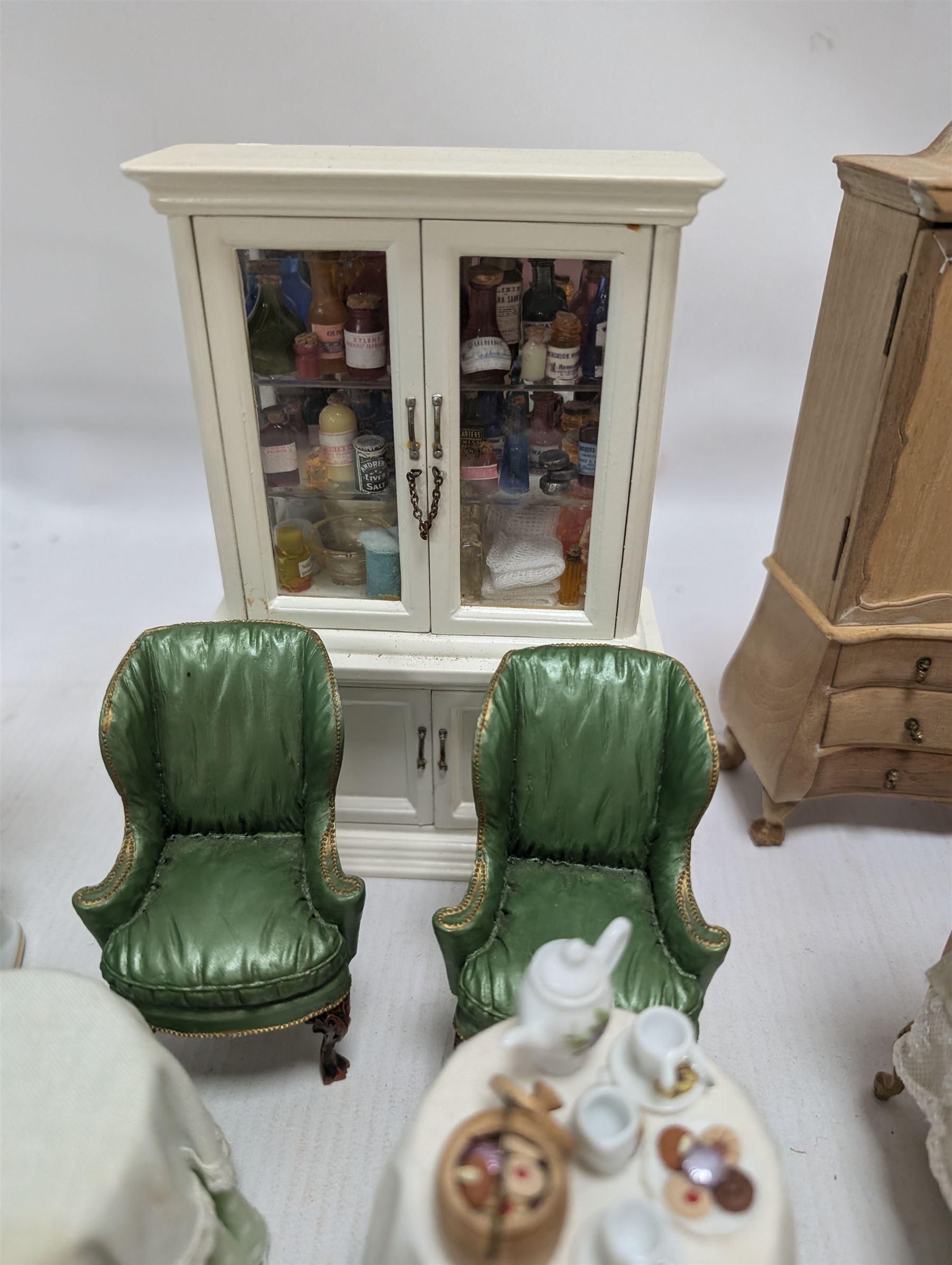 Dolls house bathroom and bedroom furniture, including bed, wardrobe, dresser filled with toiletries, shower, five figures, etc 