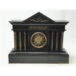  Victorian polished black slate mantel clock, Temple shaped case with brass frieze and columns, circular Roman dial signed Gowland Sunderland & Paris, twin train movement striking the half hours on a coil, H44cm, W53cm, H44cm  