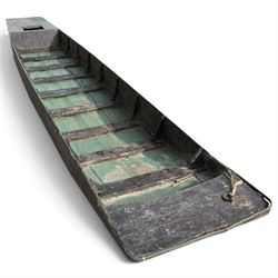 Large early 20th century plank-built wooden river punt, the long tapering hull with enclosed fore and aft decks, open green-painted ribbed interior, together with two paddles