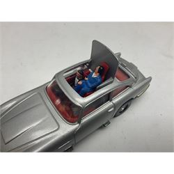 Corgi - die-cast model of James Bond Aston Martin DB5 No.271 with silver body and red interior, gold bumpers and four-spoke wheels, James Bond and two bandit figures; original window box with header card; and Dinky Shado 2 Mobile with one missile No.353; in window box (2)