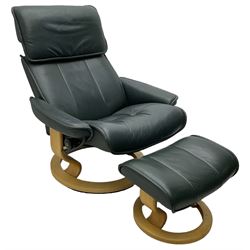 Ekornes Stressless - swivel and reclining armchair upholstered in green leather; matching stool