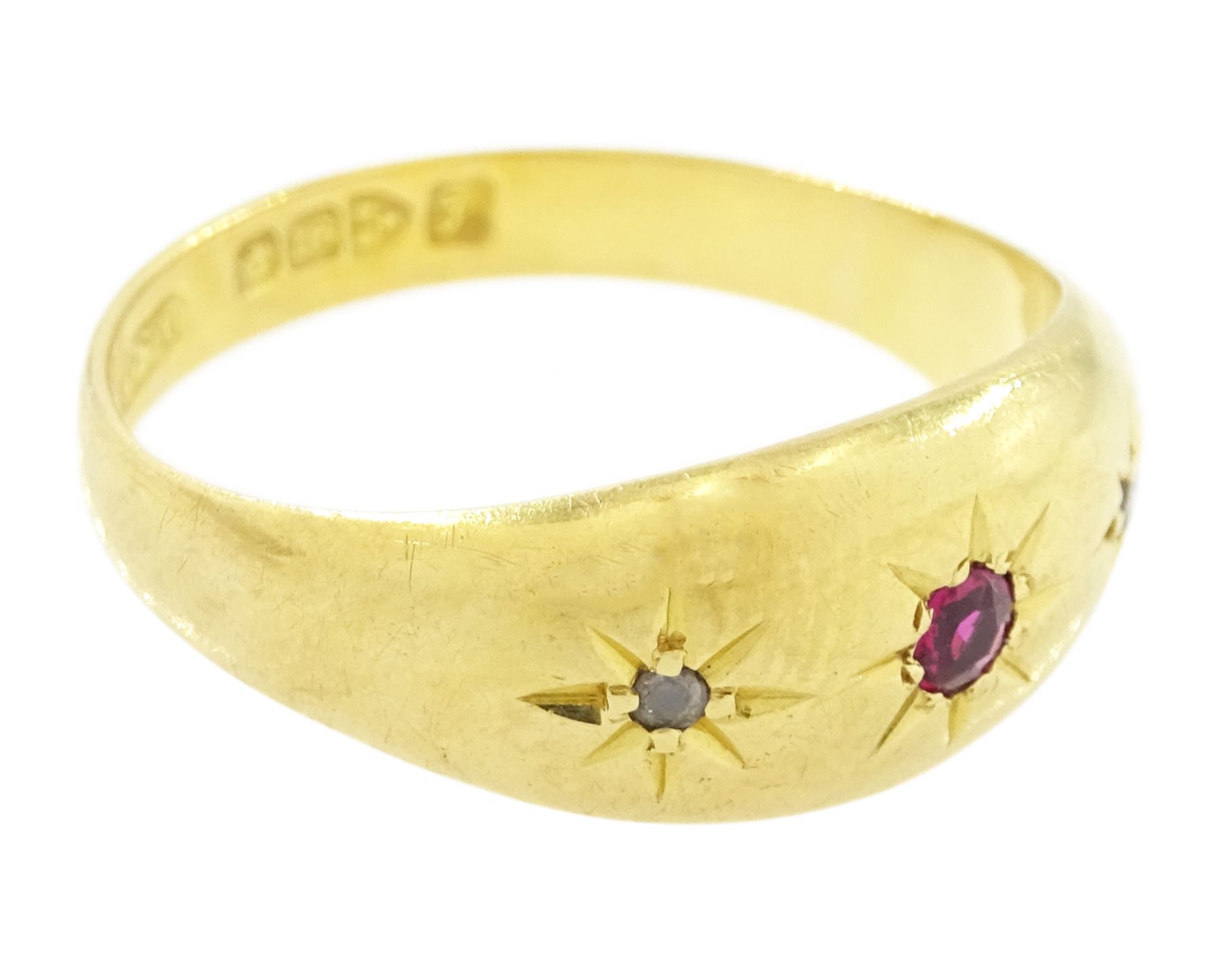 Early 20th century 18ct gold ruby and diamond gypsy ring, single round cut ruby with a rose cut diamond set either side, Chester 1919