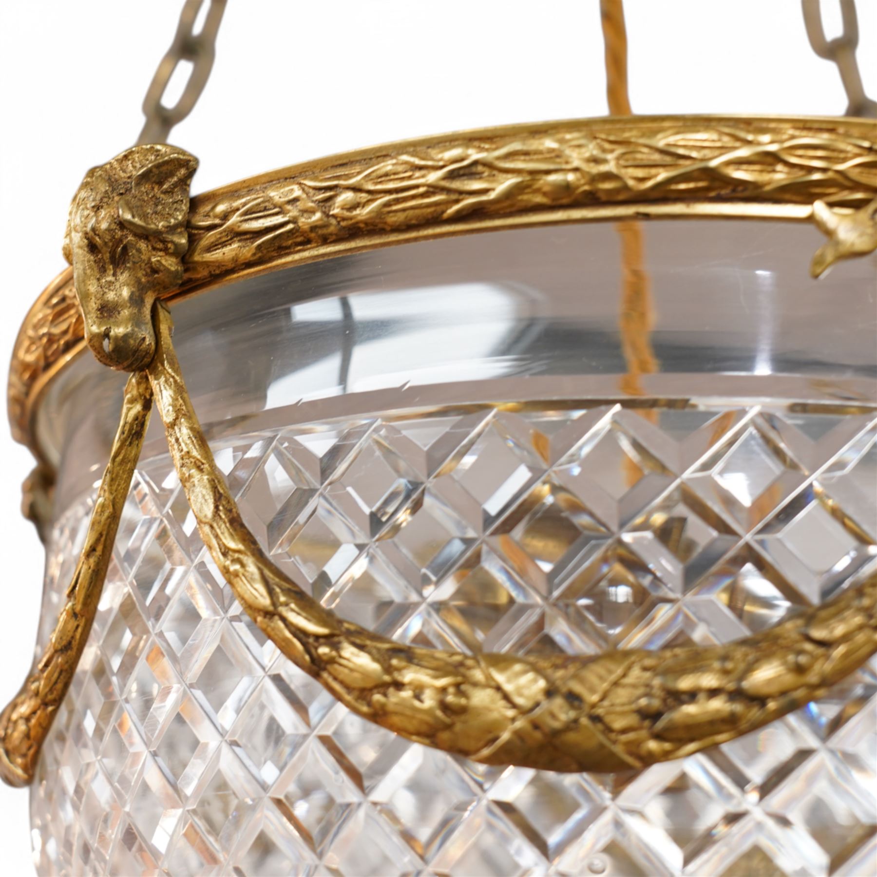 Late 20th century gilt metal ceiling light, circular form decorated with rams heads and swags, frosted glass bowl with bevelled decoration (D51cm); together with another late 20th century gilt metal ceiling ight, decorated with ribbons and rams heads with laurel swags, moulded glass bowl (D32cm)