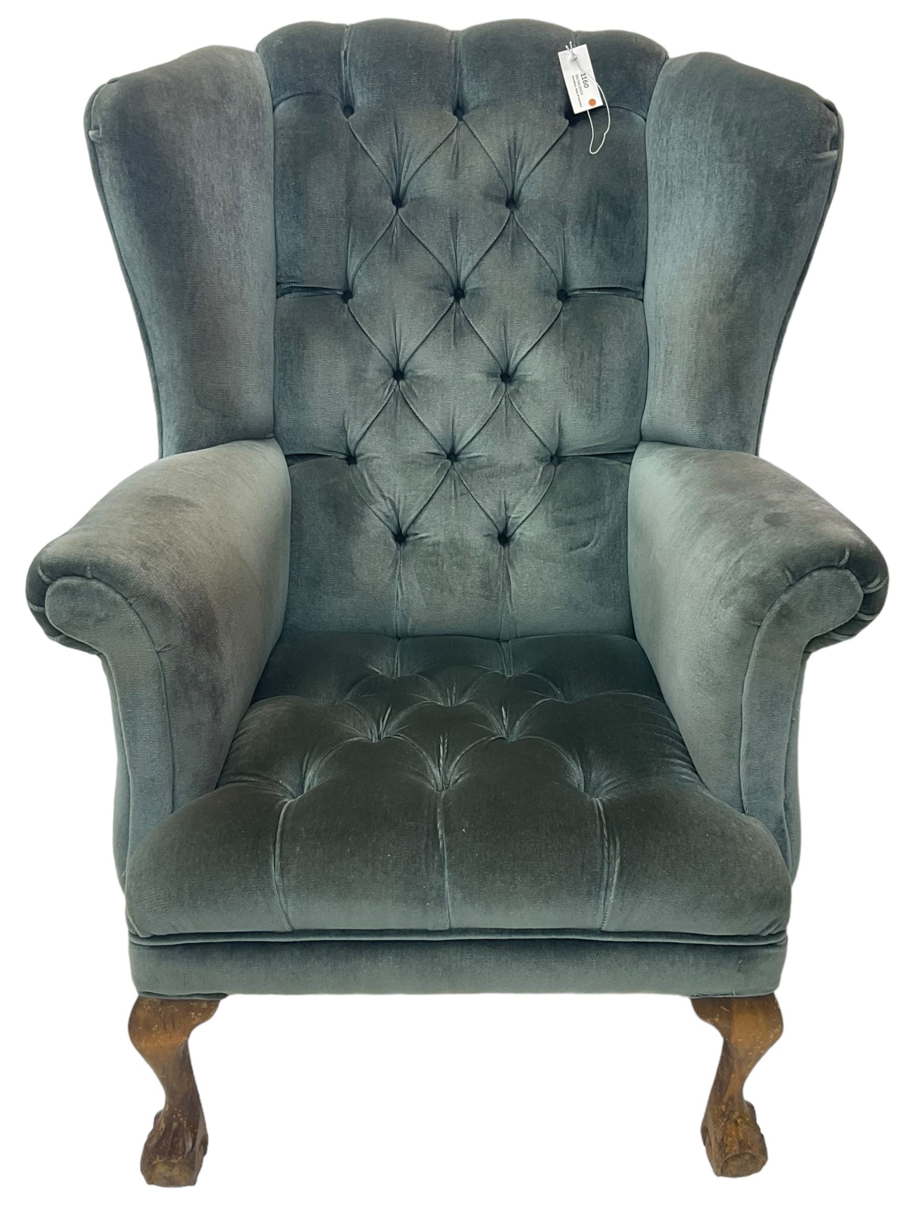 Georgian design wingback armchair, traditional shape with rolled arms, upholstered in teal velvet fabric, on cabriole supports with ball and claw feet