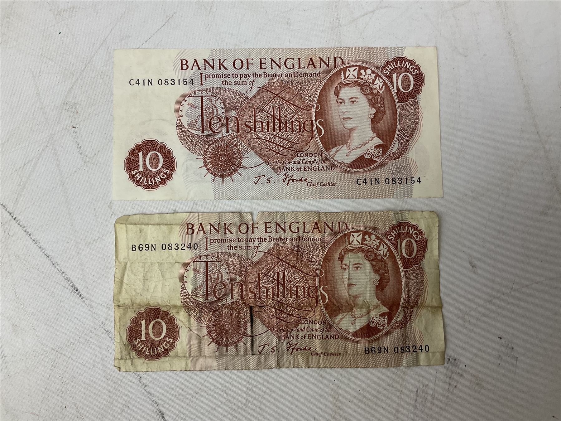 Great British and World banknotes, including Bank of England Page one pound 'EW57', Forde ten shillings 'C41N', various Belgian and Scottish notes etc