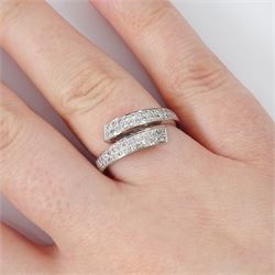 18t white gold diamond crossover ring, two rows of pave set round brilliant cut diamonds, hallmarked, total diamond weight 0.34 carat