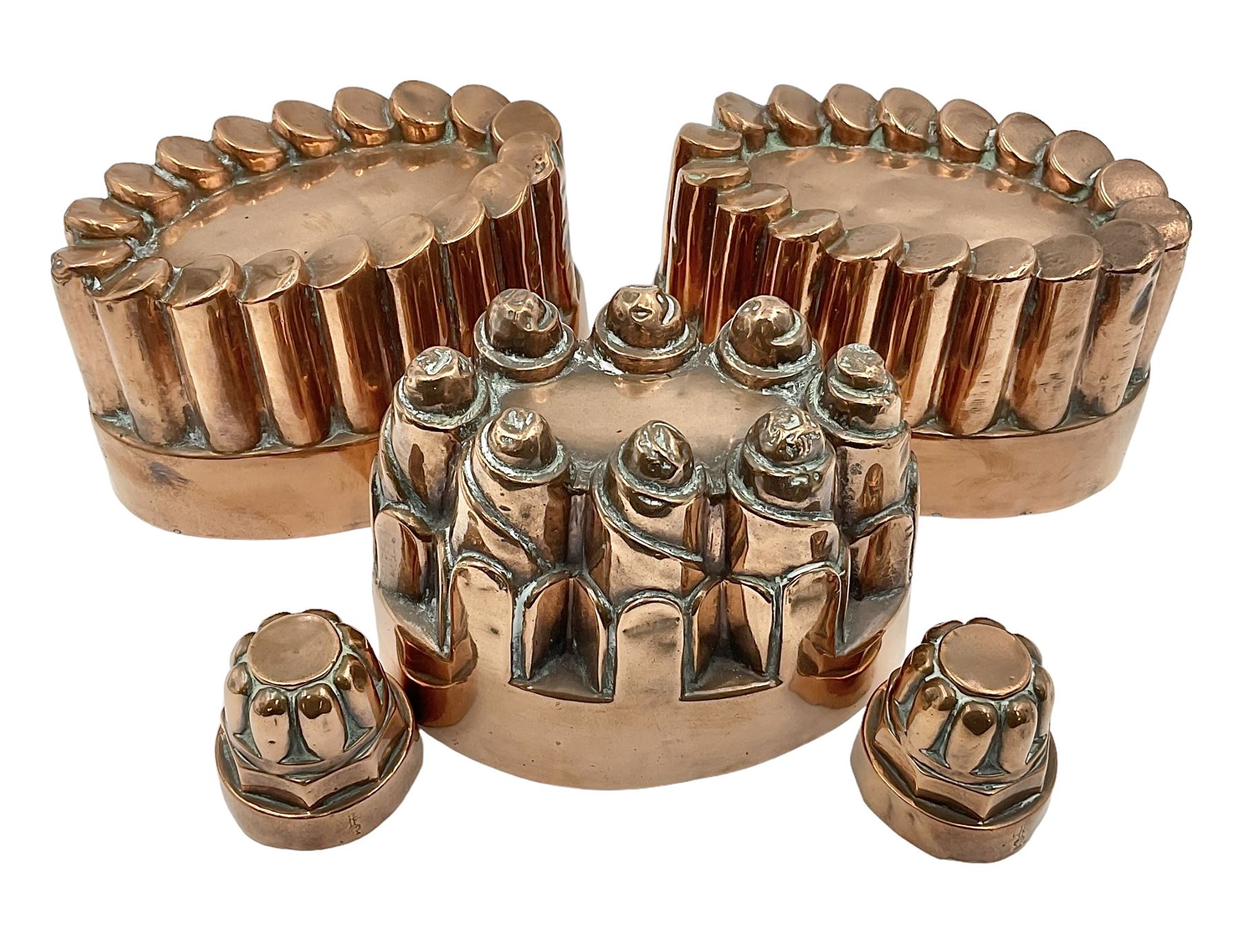 Five Victorian copper jelly mould, largest H10cm, L16cm