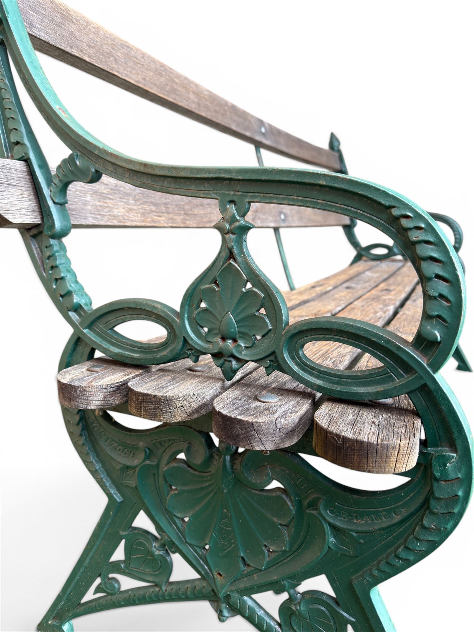 Coalbrookdale - Lily Pad design cast iron an wood slatted garden bench, late 19th century Aesthetic Movement, no. 217569, painted in green with iron centre support and seat stretcher, hardwood slatted