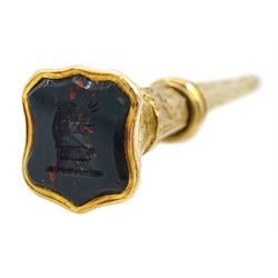 Gold cameo brooch depicting a Roman centurion, 9ct gold circular bloodstone and carnelian watch key, Birmingham 1897 and two other stone set watch keys