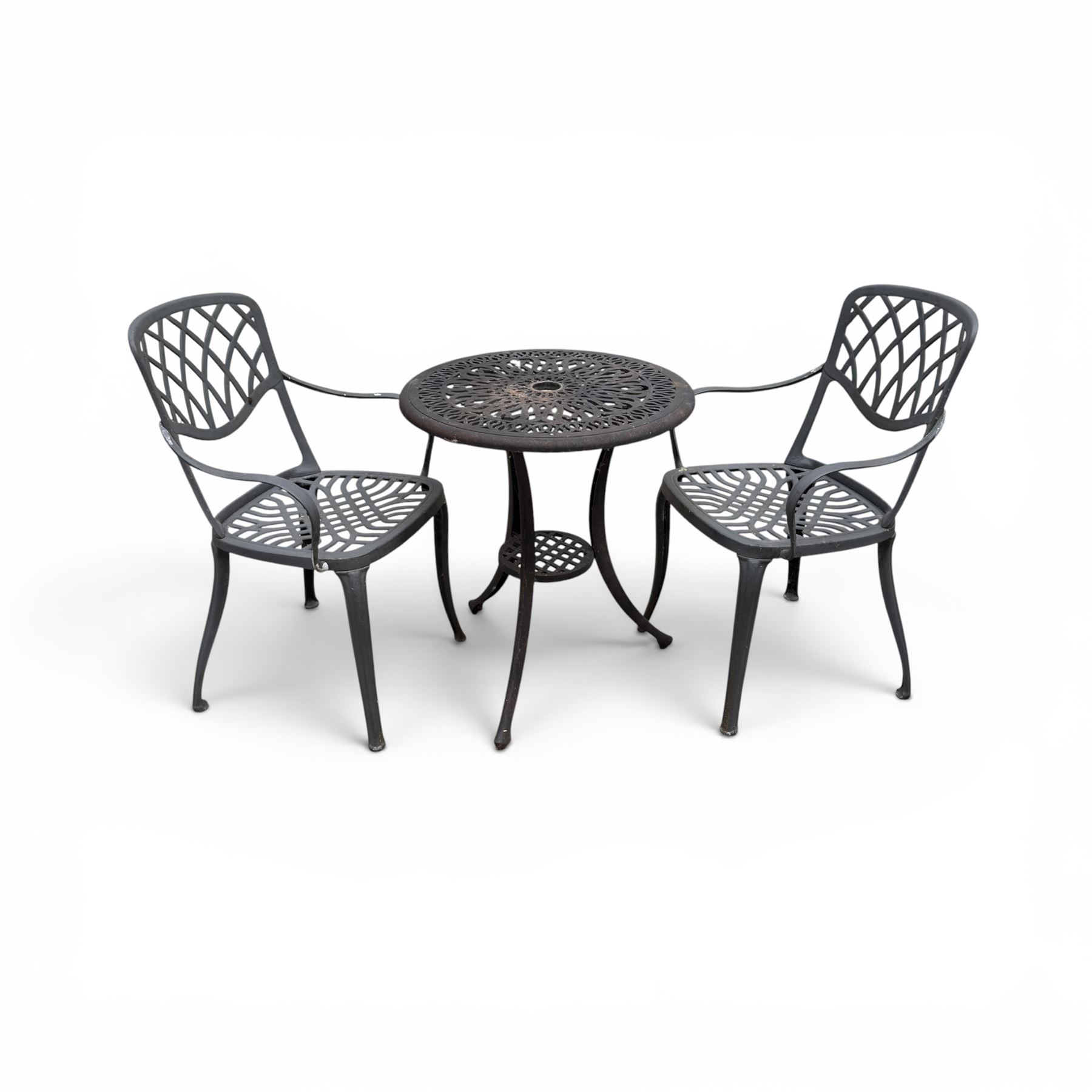 Circular cast aluminium garden table and pair of armchairs chairs with lattice backs in a dark grey finish