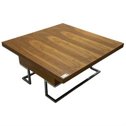 Contemporary walnut metamorphic coffee or dining table, square fold-over top on lift-up mechanism, on angular burnished metal supports 