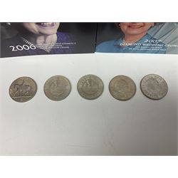 Seven Queen Elizabeth II United Kingdom five pound coins, including 2006 and 2007 in card folders, etc. 