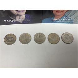Seven Queen Elizabeth II United Kingdom five pound coins, including 2006 and 2007 in card folders, etc. 