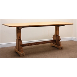  Stripped and waxed pine rectangular table canted corners, solid end supports on arched sledge feet, W171cm, H72cm, D70cm  