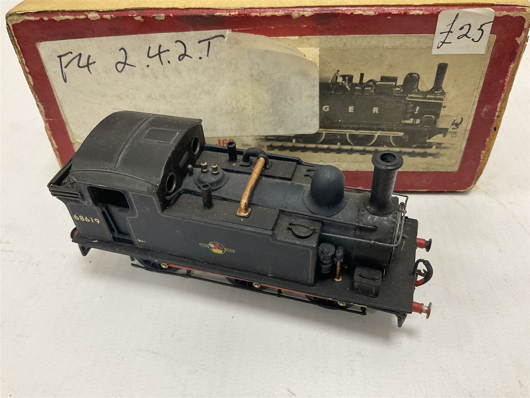 ‘00’ gauge - three steam locomotives and comprising two kit built examples; J69 Class 0-6-0T no.68619 in BR dark blue; J69 Class 0-6-0T no.68626 in BR black; with Wills Finecast boxes; one further similar example Class J67 ‘Buckjumper’ 0-6-0 no.372 being comprised of a singular heavy metal body and chassis; all models with Wills Finecast boxes (3) 