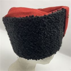 WW2 German small size Balkan style hat with 'SS' metal badges; red cloth top and flash to front with black persianelle type sides; lined in brown card with leather sweatband