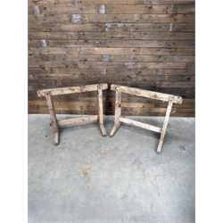 Pair of late 19th century pitch pine trestles, square tapering form in stripped finish