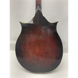 Eastern eight-string mandolin with sunburst finish and mother-of-pearl inlay L68.5cm; and another Harmony mandolin with cracked headstock (2)