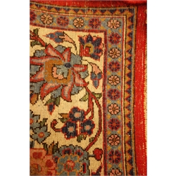  Persian Kashan red ground rug, floral overall field with blue medallion and spandrels, beige repeating border with guards, 213cm x 128cm  