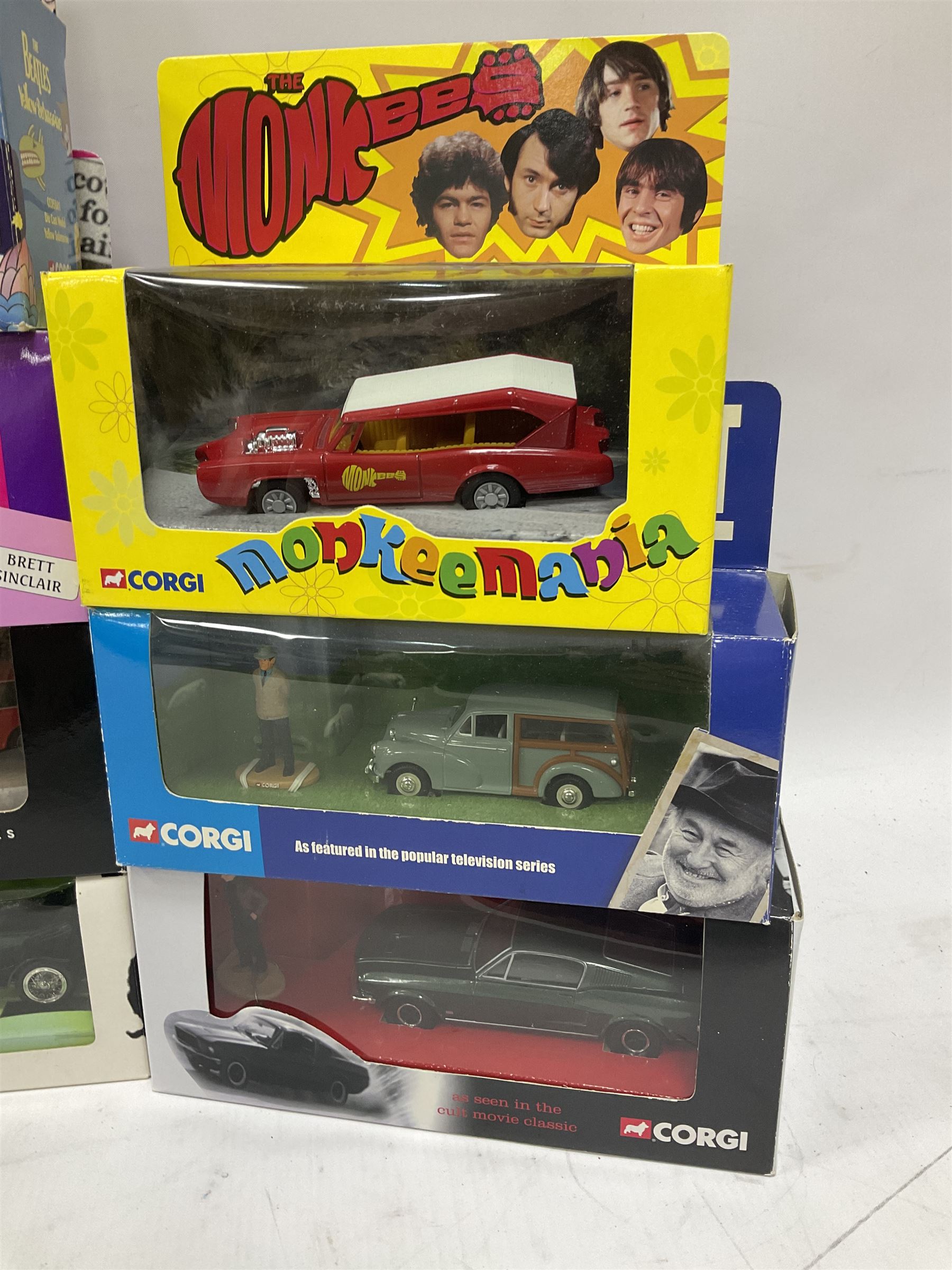 Corgi - sixteen TV/Film related die-cast models including Fawlty Towers, Bullitt, Beatles, Buster, Mr. Bean, Some Mothers,  Monkees, Ballykissangel, Heartbeat, The Avengers, Smokey & The Bandit etc; all boxed (16)