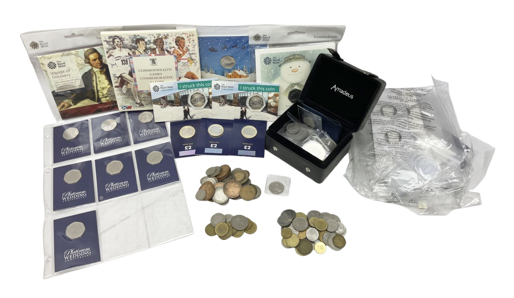 Great British and World coins, including two The Royal Mint Experience 2018 Sir Isaac Newton fifty pence coins on cards, commemorative crowns, Queen Elizabeth II 1999 five pounds, pre-decimal coinage, various Isle of Man fifty pence pieces etc