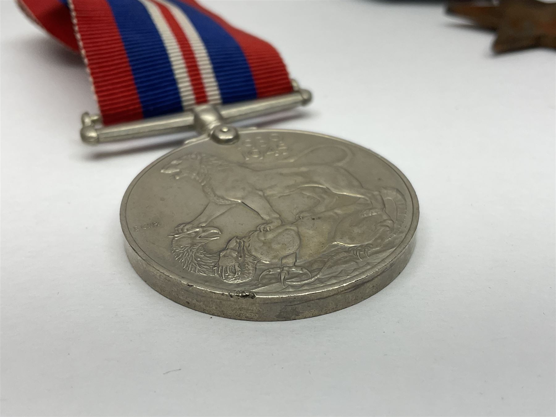 WW2 group of three medals comprising 1939-1945 War Medal, France & Germany Star and 1939-1945 Star; all with ribbons; 1930s Hull Savings Bank silver and enamel presentation fob; three medallions depicting Hitler, Mussolini and Mao Tse Tung; quantity of modern crowns and other coins; and a 6mm Flobert style starting pistol